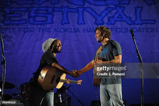 Ziggy Marley and Jack Johnson shake hands after performing together at the Kokua Festival 2010 on April 23, 2010 in Honolulu, Hawaii.