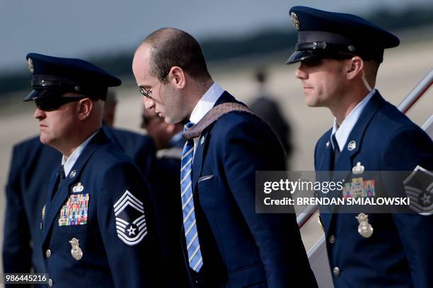 Advisor Stephen Miller with US President Donald Trump arrives at Andrews Air Force Base June 28, 2018 in Andrews Air Force Base, Maryland.