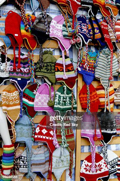 hats for sale in a london market - newpremiumuk stock-fotos und bilder