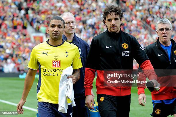 Aaron Lennon of Tottenham Hotspur and Owen Hargreaves of Manchester United head for the bench prior to the Barclays Premier League match between...