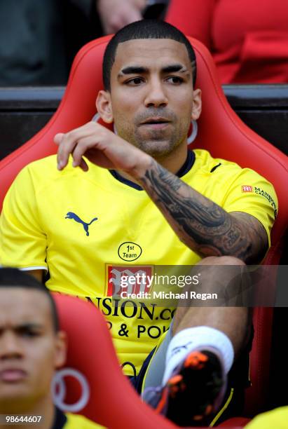 Aaron Lennon of Tottenham Hotspur looks on from the bench prior to the Barclays Premier League match between Manchester United and Tottenham Hotspur...