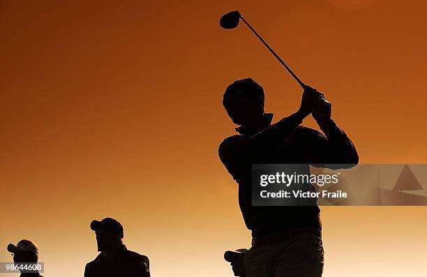 Nicolas Colsaerts of Belgium tees off on the 18th green during the Round Two of the Ballantine's Championship at Pinx Golf Club on April 24, 2010 in...