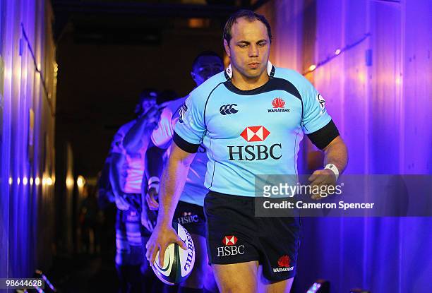 Waratahs captain Phil Waugh leads his team onto the field during the round 11 Super 14 match between the Waratahs and the Brumbies at ANZ Stadium on...