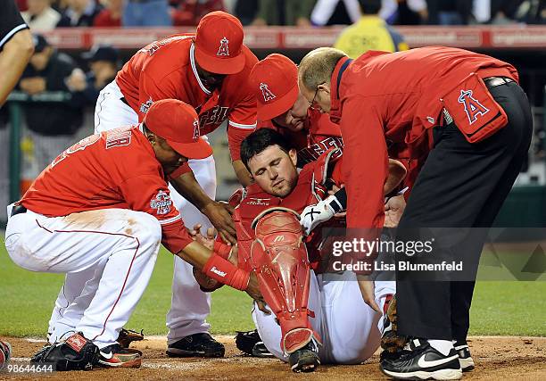 Bobby Wilson of the Los Angeles Angels of Anaheim is injured after a play at the plate in the third inning against the New York Yankees on April 23,...