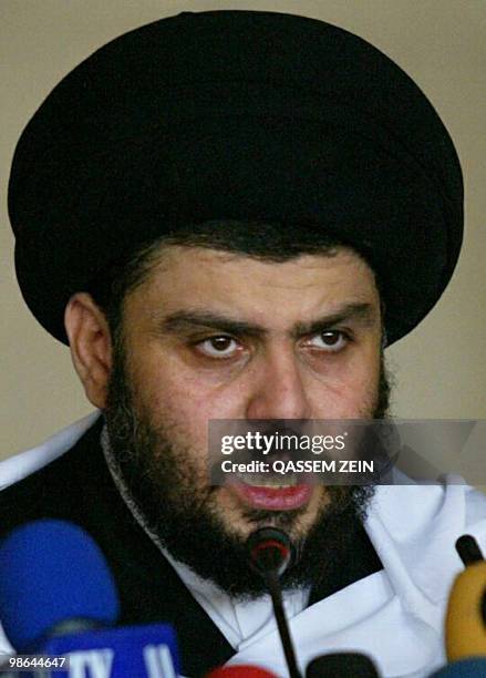 -- File pictured dated May 25, 2007 shows radical Shiite cleric Moqtada al-Sadr addressing supporters at Friday prayers at his local mosque in Kufain...