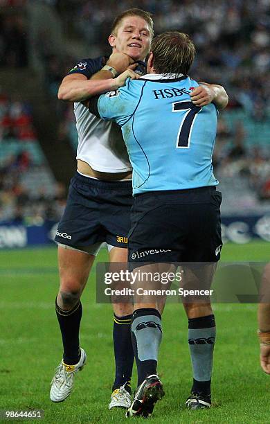 Josh Valentine of the Brumbies and Phil Waugh of the Waratahs have an altercation during the round 11 Super 14 match between the Waratahs and the...