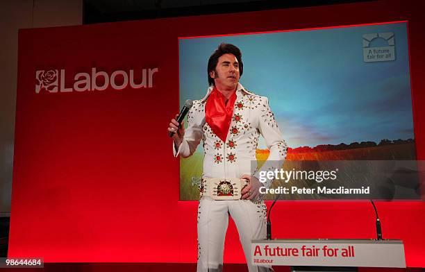 Elvis impersonator Mark Wright entertains Labour party supporters at Lodge Park Technology College on April 24, 2010 in Corby, England. The General...