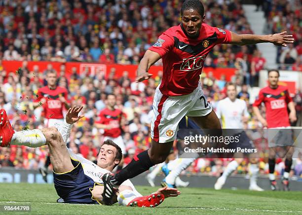 Antonio Valencia of Manchester United clashes with Gareth Bale of Tottenham Hotspur during the Barclays Premier League match between Manchester...