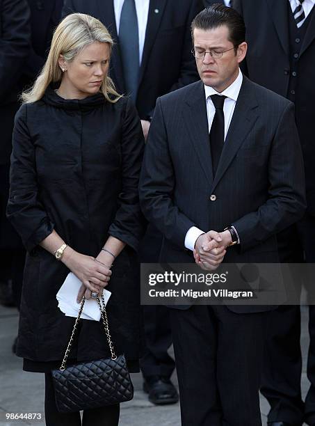 German Defense Minister Karl-Theodor zu Guttenberg and his wife Stephanie attend a funeral service for four killed German ISAF soldiers at the...