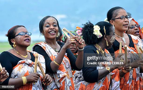 Local cultural band waits to welcome French President Nicolas Sarkozy on his arrival at Mamoudzou for an official visit to the French Mayotte...