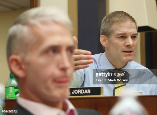 Rep. Trey Gowdy , and Jim Jordan listen to FBI Director Christopher Wray U.S. Deputy Attorney General Rod Rosenstein testify during a House Judiciary...