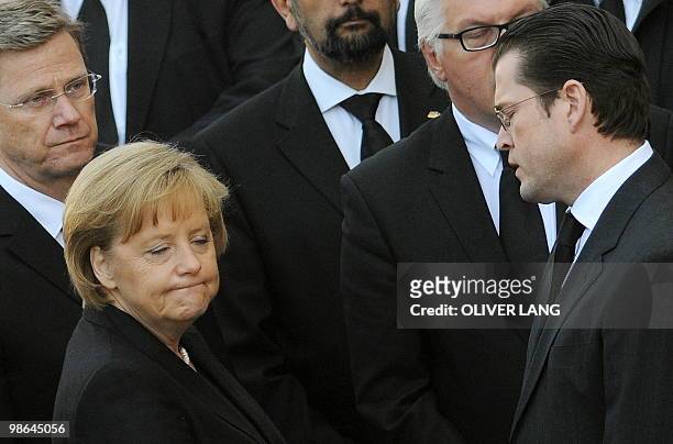 German Foreign Minister and vice-chancellor Guido Westerwelle, German Chancellor Angela Merkel and German Defence Minister Karl-Theodor zu Guttenberg...