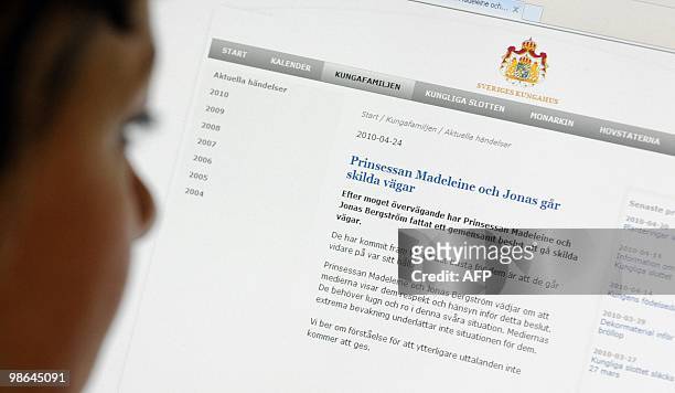 Woman read the press statement regarding the break up between Princess Madeleine and Jonas Bergstrom at the Swedish Royal Court web site on April 24,...