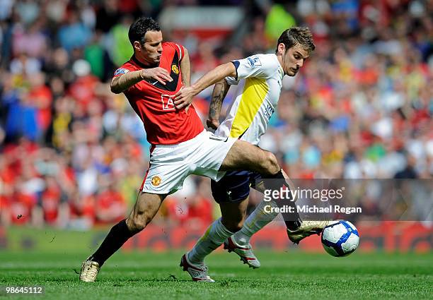 Ryan Giggs of Manchester United battles for the ball with David Bentley of Tottenham Hotspur during the Barclays Premier League match between...