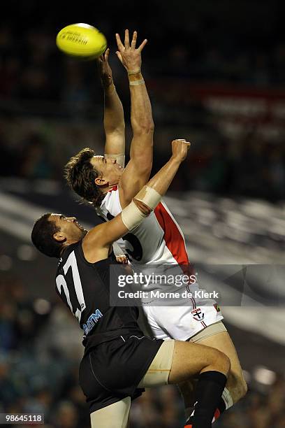 Justin Koschitzke of the Saints misses a mark while under pressure from opponent Alipate Carlile of the Power during the round five AFL match between...