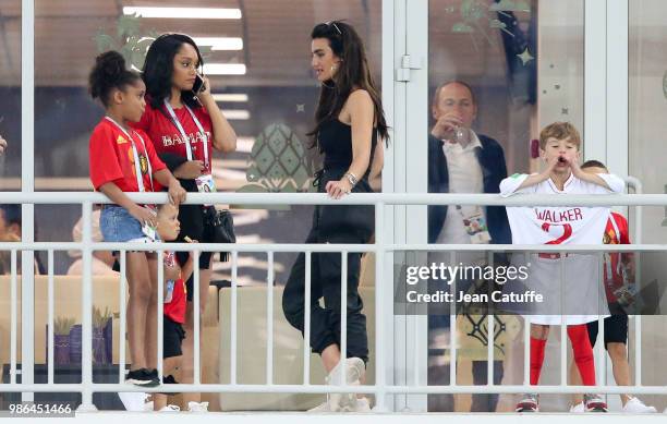 Carla Higgs Kompany, wife of Vincent Kompany of Belgium chats with Annie Kilner, girlfriend of Kyle Walker of England following the 2018 FIFA World...