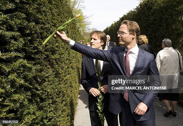 Prince Jaime de Bourbon de Parme , son of Dutch princess Irene, puts a flower in the hedge of the Dachau-monument in Amsterdam, on April 24, 2010....