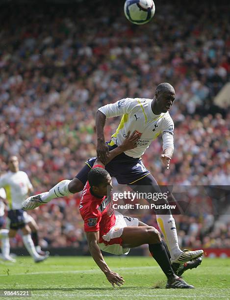 Antonio Valencia of Manchester United clashes with Ledley King of Tottenham Hotspur during the Barclays Premier League match between Manchester...