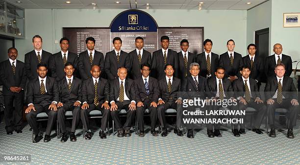 Sri Lankan cricketers pose for a group photo at the Sri Lanka Cricket headquarters in Colombo on April 24, 2010. The team performed religious rituals...