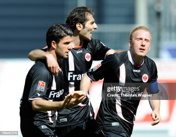 Uemit Korkmaz , Halil Altintop and Patrick Ochs of Frankfurt celebrate the 1:0 from Alexander Meier during the Bundesliga match between FSV Mainz 05...