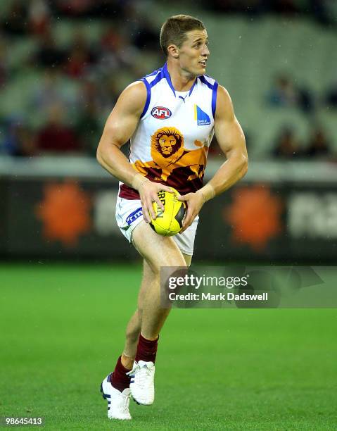 Matt Maguire of the Lions looks for a teammate during the round five AFL match between the Melbourne Demons and the Brisbane Lions at Melbourne...