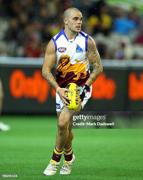 Ashley McGrath of the Lions looks for a teammate during the round five AFL match between the Melbourne Demons and the Brisbane Lions at Melbourne...