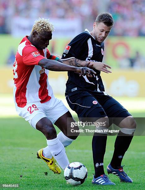 Aristide Bance of Mainz battles for the ball with Marco Russ of Frankfurt during the Bundesliga match between FSV Mainz 05 and Eintracht Frankfurt at...