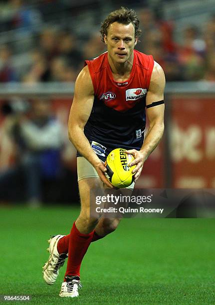 James McDonald of the Demons kicks during the round five AFL match between the Melbourne Demons and the Brisbane Lions at Melbourne Cricket Ground on...