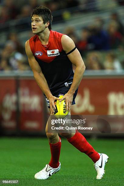 Stefan Martin of the Demons kicks during the round five AFL match between the Melbourne Demons and the Brisbane Lions at Melbourne Cricket Ground on...