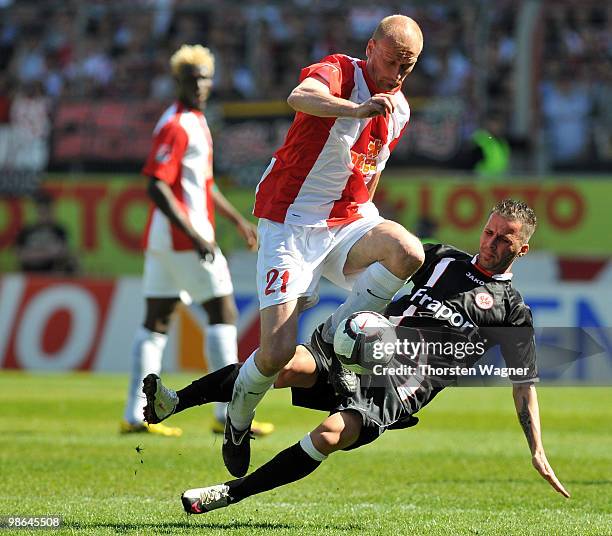 Aristide Bance of Mainz battles for the ball with Benjamin Koehler of Frankfurt during the Bundesliga match between FSV Mainz 05 and Eintracht...