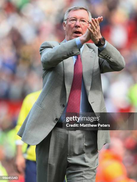 Sir Alex Ferguson of Manchester United applauds the fans after the Barclays Premier League match between Manchester United and Tottenham Hotspur at...