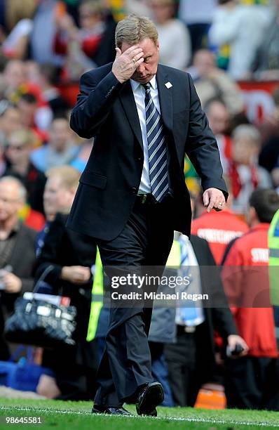 Tottenham Hotspur Manager Harry Redknapp heads for the dressing room at the end of the Barclays Premier League match between Manchester United and...