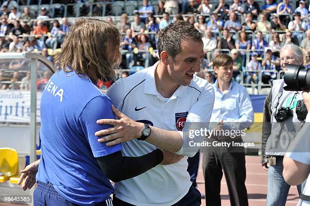 Rene van Eck, head coach of FC Carl Zeiss Jena and Frank Schmidt, head coach of 1. FC Heidenheim during the Third League match between Carl Zeiss...