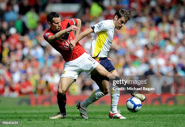 Ryan Giggs of Manchester United battles for the ball with David Bentley of Tottenham Hotspur during the Barclays Premier League match between...