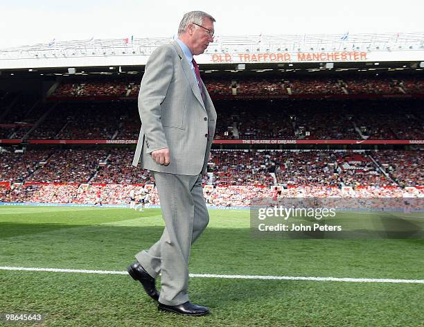 Sir Alex Ferguson of Manchester United walks to the dugout during the Barclays Premier League match between Manchester United and Tottenham Hotspur...