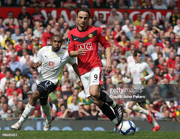 Dimitar Berbatov of Manchester United clashes with Wilson Palacios of Tottenham Hotspur during the Barclays Premier League match between Manchester...