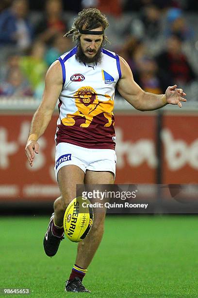 Travis Johnstone of the Lions kicks during the round five AFL match between the Melbourne Demons and the Brisbane Lions at Melbourne Cricket Ground...