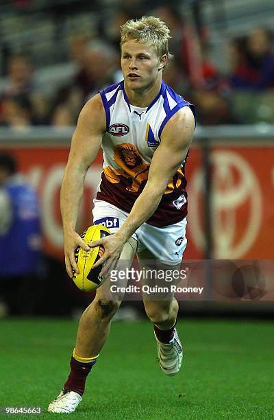 Daniel Rich of the Lions kicks during the round five AFL match between the Melbourne Demons and the Brisbane Lions at Melbourne Cricket Ground on...