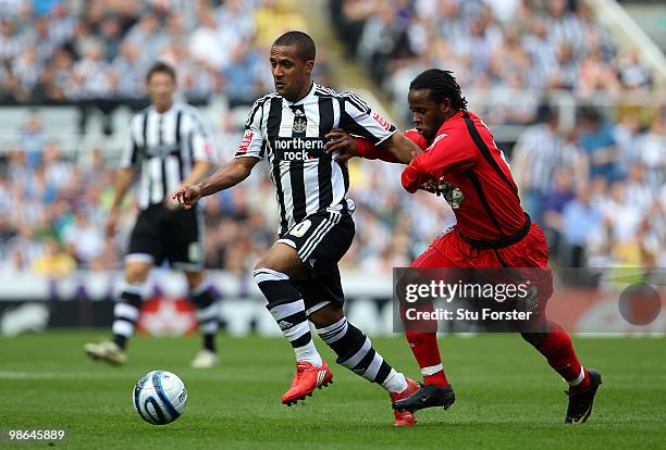 Newcastle winger Wayne Routledge tangles with Jamie Peters of Ipswich during the Coca Cola Championship match between Newcastle United and Ipswich...