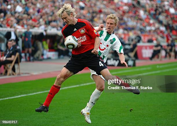 Sami Hyypiae of Leverkusen and Mike Hanke of Hannover fight for the ball during the Bundesliga match between Bayer Leverkusen and Hannover 96 at...