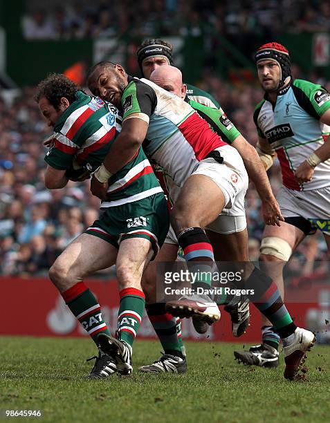 Geordan Murphy of Leicester is tackled by Jordan-Turner Hall during the Guinness Premiership match between Leicester Tigers and Harlequins at Welford...