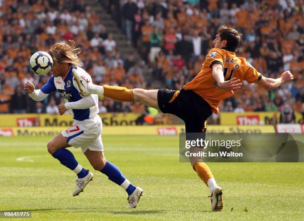 Stephen Ward of Wolverhampton Wanderers tries to tackle Michel Salgado of Blackburn Rovers during the Barclays Premier League match between...