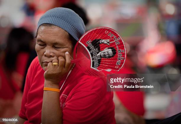 Red shirt protester sleeps off the heat of the day inside the redshirt camp April 24, 2010 in Bangkok, Thailand. Thailand's political crisis plunged...