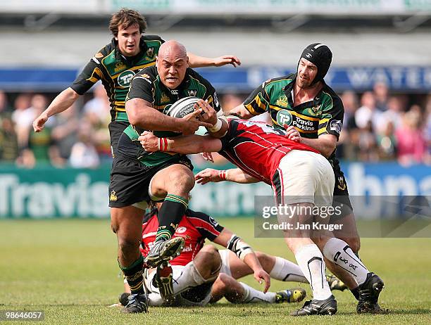 Soane Tonga'uiha of Northampton on the pace with Petrus du Plessis of Saracens looking to bring him down during the Guinness Premiership match...