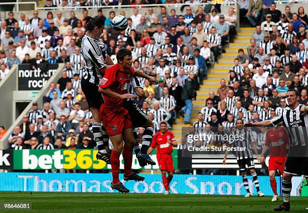 Newcastle striker Andy Carroll heads in the first Newcastle goal during the Coca Cola Championship match between Newcastle United and Ipswich Town at...