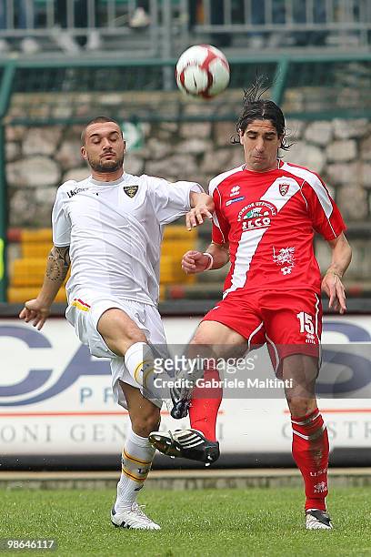 Marco Turati of US Grosseto FC in action against Daniele Corvia of US Lecce during the Serie B match between US Grosseto FC and US Lecce at Stadio...