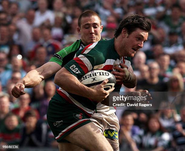 Matt Smith of Leicester breaks clear of Mike Brown to score a try during the Guinness Premiership match between Leicester Tigers and Harlequins at...