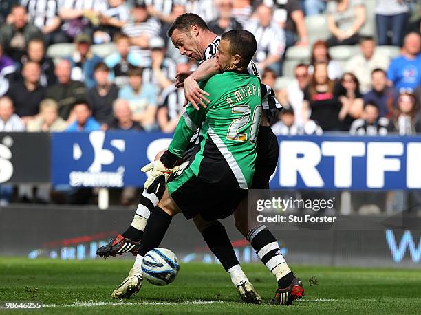 Newcastle player Kevin Nolan tangles with Ipswich goalkeeper Brian Murphy during the Coca Cola Championship match between Newcastle United and...