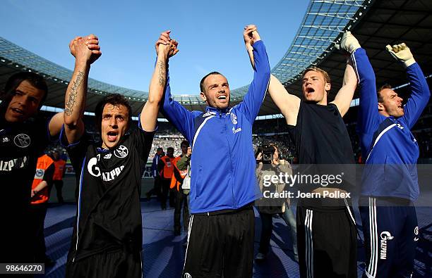 Heiko Westermann of Schalke celebrates with his team mates after winning the Bundesliga match between Hertha BSC Berlin and FC Schalke 04 at the...