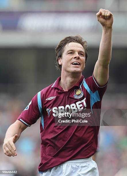 Scott Parker of West Ham celebrates scoring the third goal during the Barclays Premier League match between West Ham United and Wigan Athletic at the...